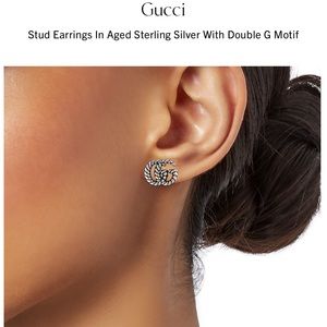 Authentic Gucci double-G stud earring.